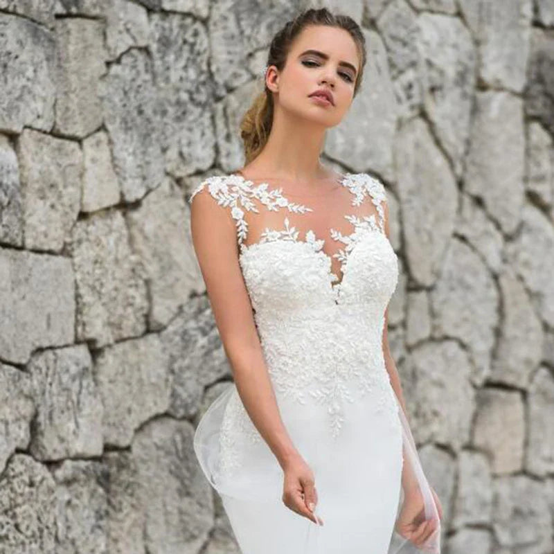 Vestido de novia de sirena sexy con espalda transparente y sin mangas con apliques de encaje para novia 