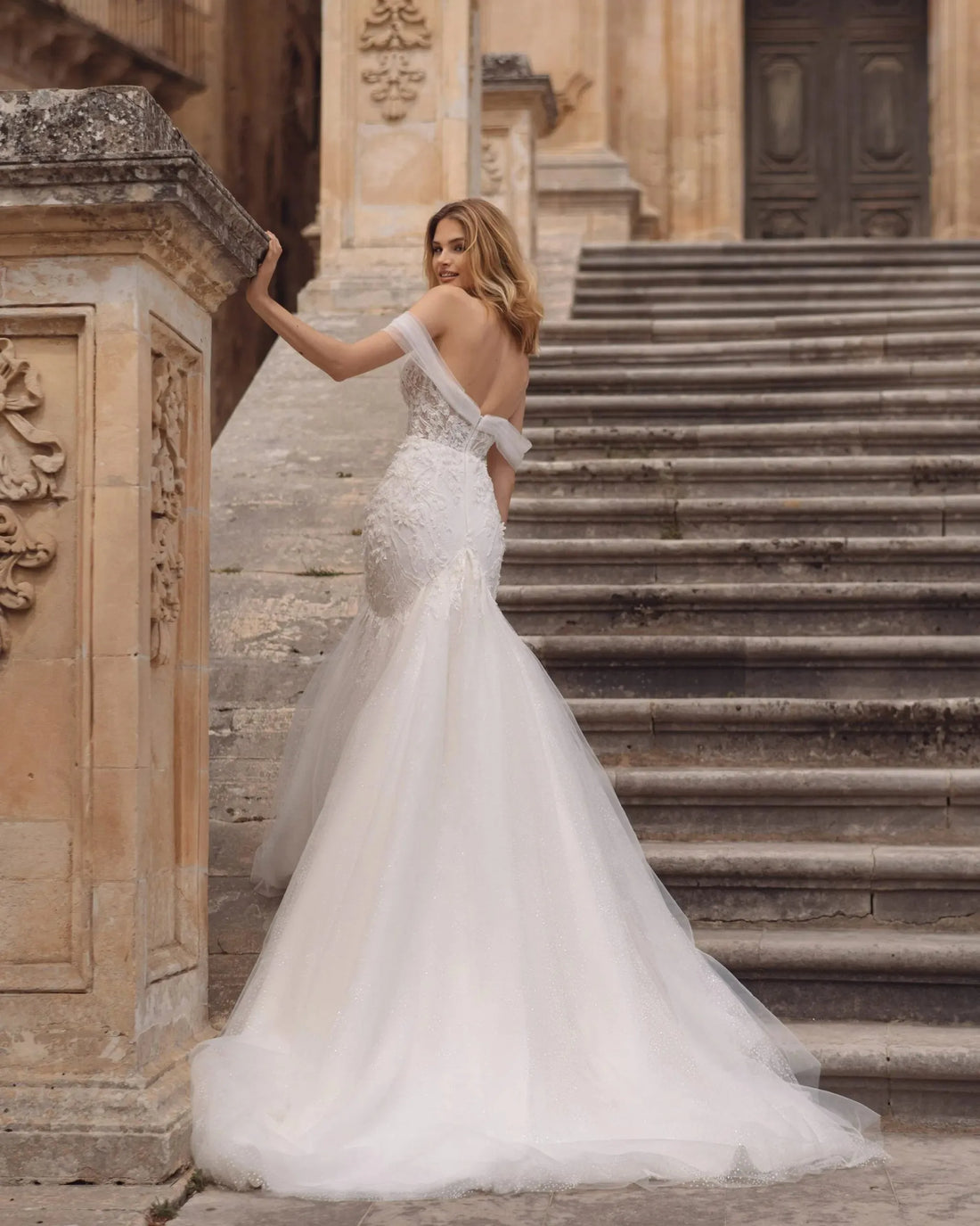 Exquisite Mermaid Wedding Gown, Off-Shoulder Neckline, and a Flattering Natural Waistline for a Glamorous and Timeless Bridal Look
