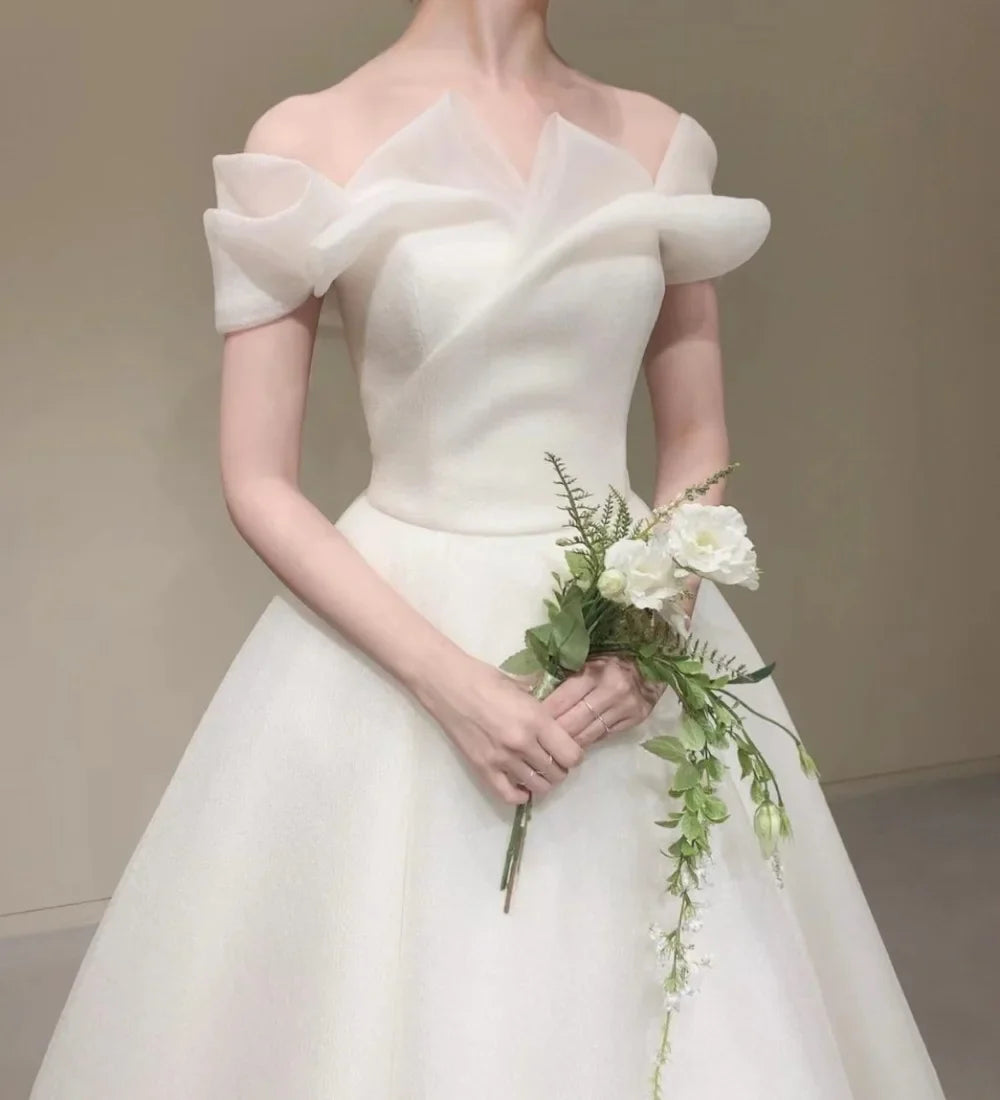 Elegantes Design Elfenbein Hochzeitskleid Off-Shoulder V-Ausschnitt Bodenlang Kurze Ärmel Organza 웨딩드레스 A-Linie Rückenfrei Koreanisch 