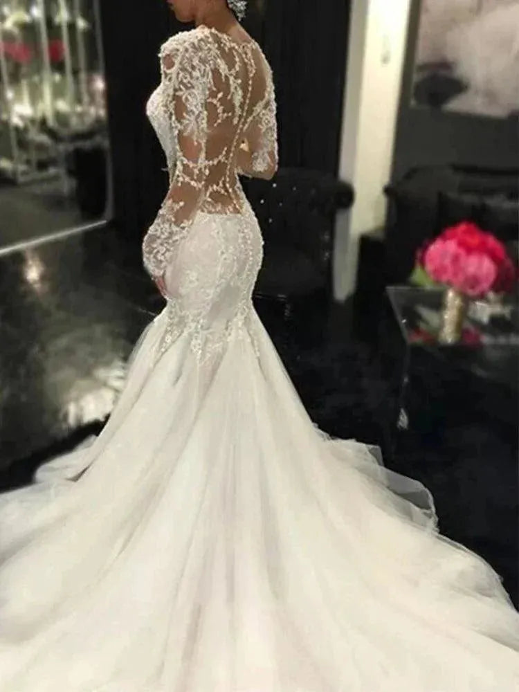 Luxury Lace Mermaid Wedding Dresses Dubai African Arabic V-neck See Through Long Sleeves Appliques Bridal Gown Vestido De Novia Ivory Mermaid