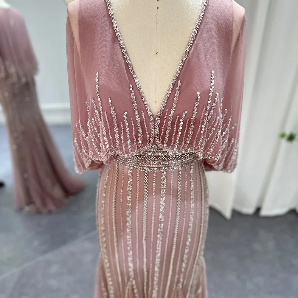 Vestidos de noche de lujo de sirena rosa de Dubái con capa, elegantes vestidos de fiesta formales de boda árabes con escote en V para mujer 