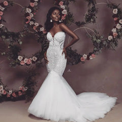 Kapokdressy African Sweetheart Mermaid Wedding Dresses Nyaste stropplösa spetspärlade bröllopsklänningar Applique Bridal Dresses