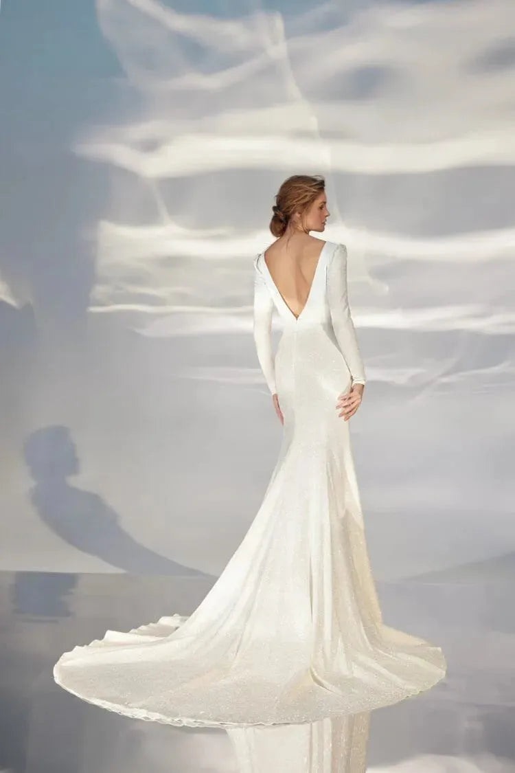 Ethereal A-Line Wedding Gown with Long Sleeves, V-Neckline, and a Natural Waistline for a Romantic and Timeless Bridal Look