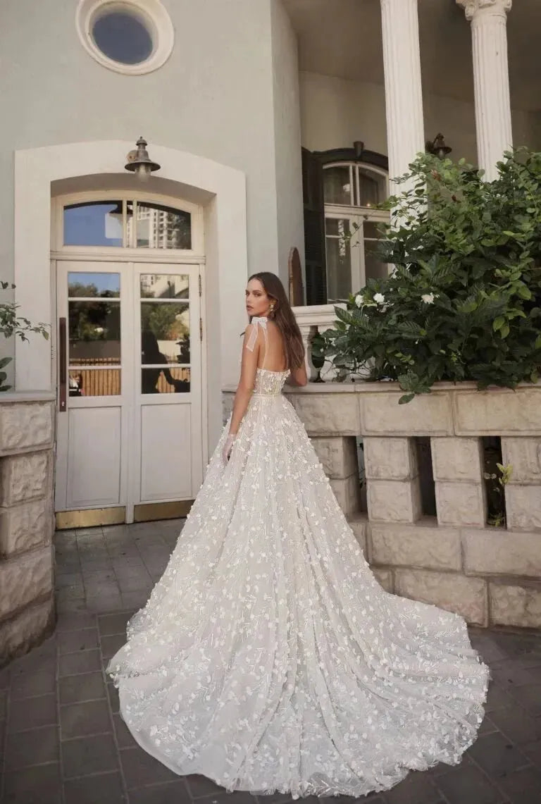 Elegant A-Line Wedding Gown with a Voluminous Skirt, Delicate Straps, Boat Neckline, and Exquisite Lace Embellishments – Romantic Bridal Dress