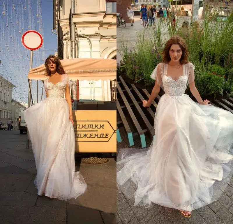 Simple Wedding Dresses Illusion Tulle Tiered Bridal Gowns Cap Sleeves A-Line Ball Gowns Graceful Vintage Vestidos De Novia As Pictures