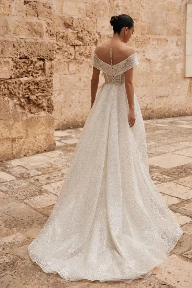 Vintage A-Line Wedding Gown – Strappy Illusion Neckline with Sequin Embellishments and a Natural Waistline for a Timeless Bridal Look