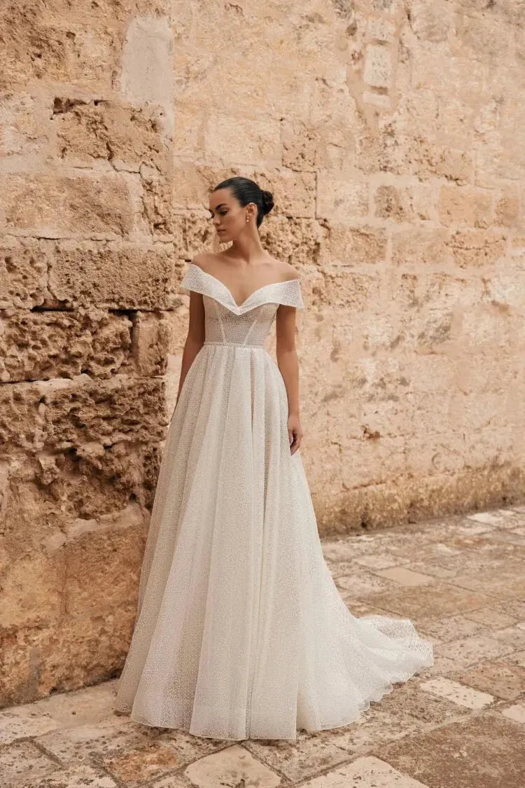 Vintage A-Line Wedding Gown – Strappy Illusion Neckline with Sequin Embellishments and a Natural Waistline for a Timeless Bridal Look